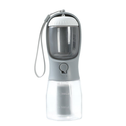 Furvana 3-in-1 grey and clear portable pet water bottle with food storage and integrated poop bag dispenser