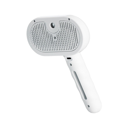 Furvana 3-in-1 white steam pet grooming brush with gentle bristles for removing loose fur and dander