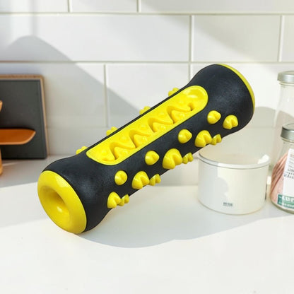 Furvana black and yellow textured TPR dental chew toy for dogs with treat-dispensing design on a white surface