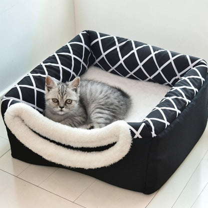 Furvana 2-in-1 black and white plush pet bed with a gray kitten resting inside, featuring a modern lattice pattern.