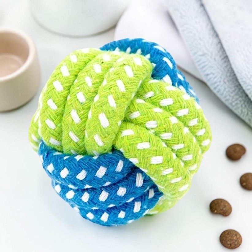 Furvana durable cotton rope ball chew toy for dogs in blue and lime green, designed for dental health and play.