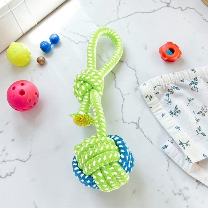 Furvana durable cotton rope chew toy with a green and blue knotted ball design for dog dental health and play