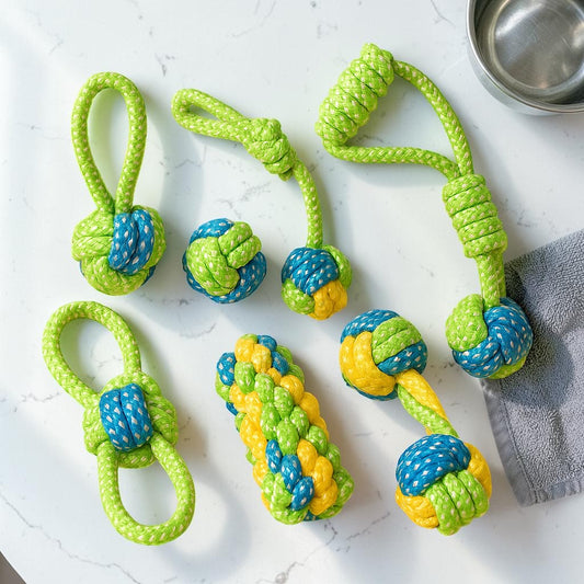 Furvana collection of durable, non-toxic cotton rope chew toys for dogs in assorted green, blue, and yellow colors.