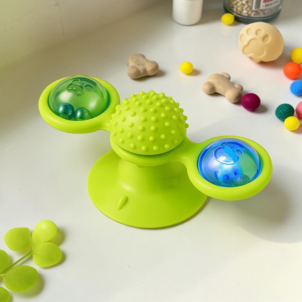 Furvana green windmill cat toy with suction base, spinning interactive compartments, and textured dental massage center