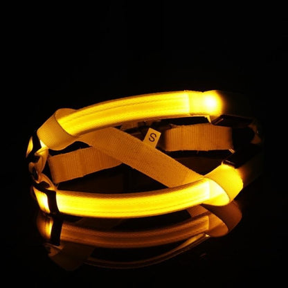 Furvana LED nylon pet safety harness glowing with bright yellow light for nighttime visibility