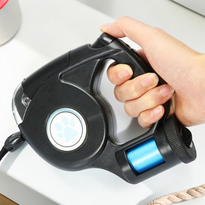 Furvana black LED retractable dog leash with ergonomic handle, thumb lock control, and integrated waste bag dispenser.