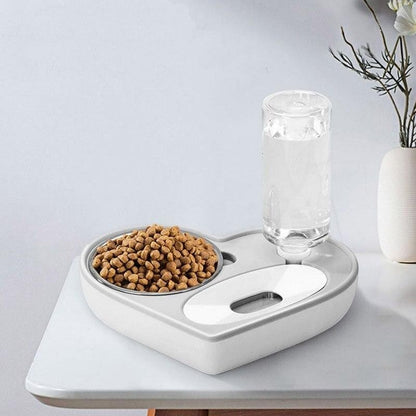 Furvana 2-in-1 pet feeder station with a stainless steel food bowl and automatic water dispenser on a white base.