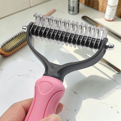 Furvana pet fur knot remover comb with dual-sided stainless steel blades and a pink ergonomic non-slip handle