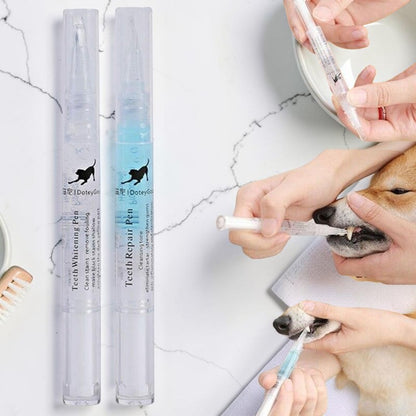 Furvana pet teeth cleaning pens with blue formula being used to clean a dog's teeth for dental health