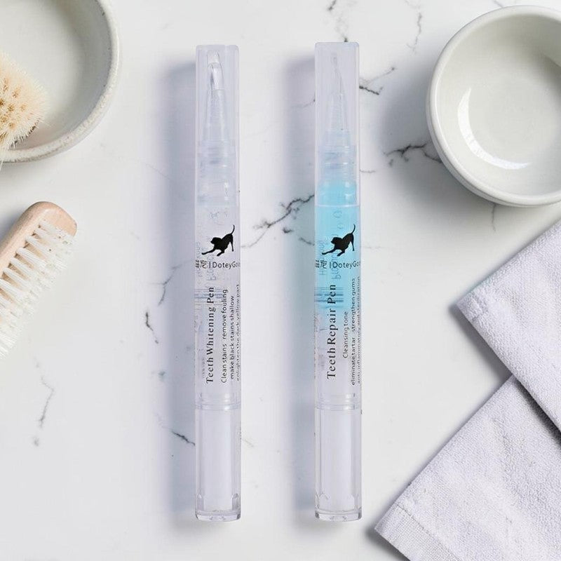 Furvana pet teeth cleaning and whitening pen set with blue and clear formulas on a marble surface
