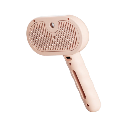 Furvana 3-in-1 steam pet brush in light pink with soft bristles for grooming cats and small pets