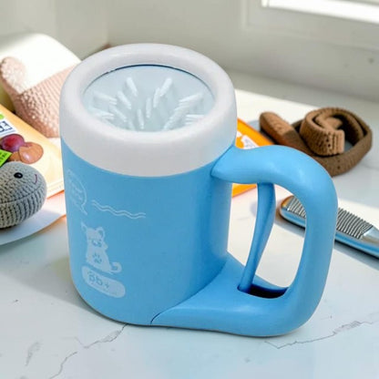 Furvana portable dog paw cleaner cup in light blue with white rim and soft internal silicone bristles for deep cleaning