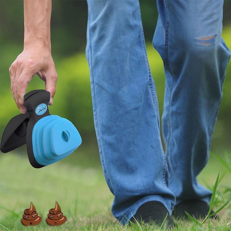 Furvana blue and black portable dog waste poop picker tool being used outdoors for easy one-handed cleanup