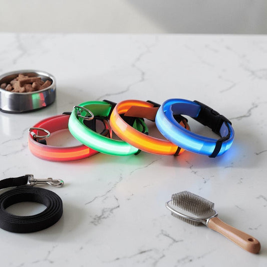 Furvana rechargeable LED dog collars in red, green, orange, and blue with adjustable buckles for nighttime safety.