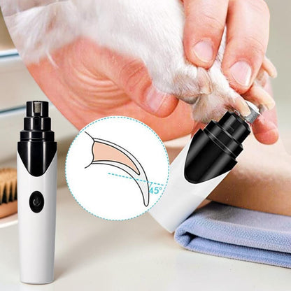 Furvana rechargeable electric pet nail grinder with a white and black ergonomic design, shown trimming a dog's nail.