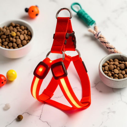 Furvana red nylon LED pet safety harness with glowing light strips for high visibility during nighttime dog walks.