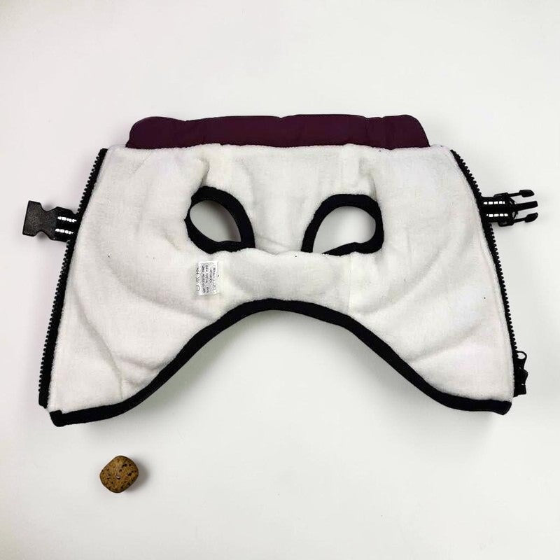 Furvana waterproof dog harness jacket interior showing soft white fleece lining and dark purple collar detail